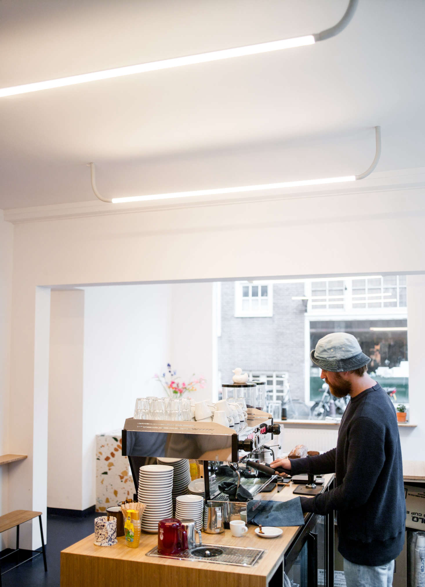 Toki An Effortlessly Cool Cafe In Amsterdam Terrazzo Included Tubular Fluorescent Mono Lights By Os Oos A Dutch Design Duo Based