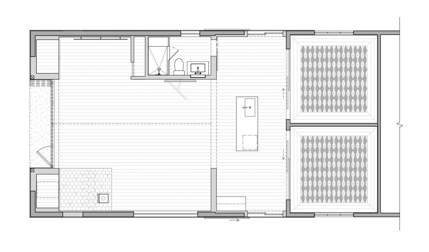 The guesthouse has two bedrooms, a kitchenette, bathroom, and lounge space totaling around 1,125 square feet.