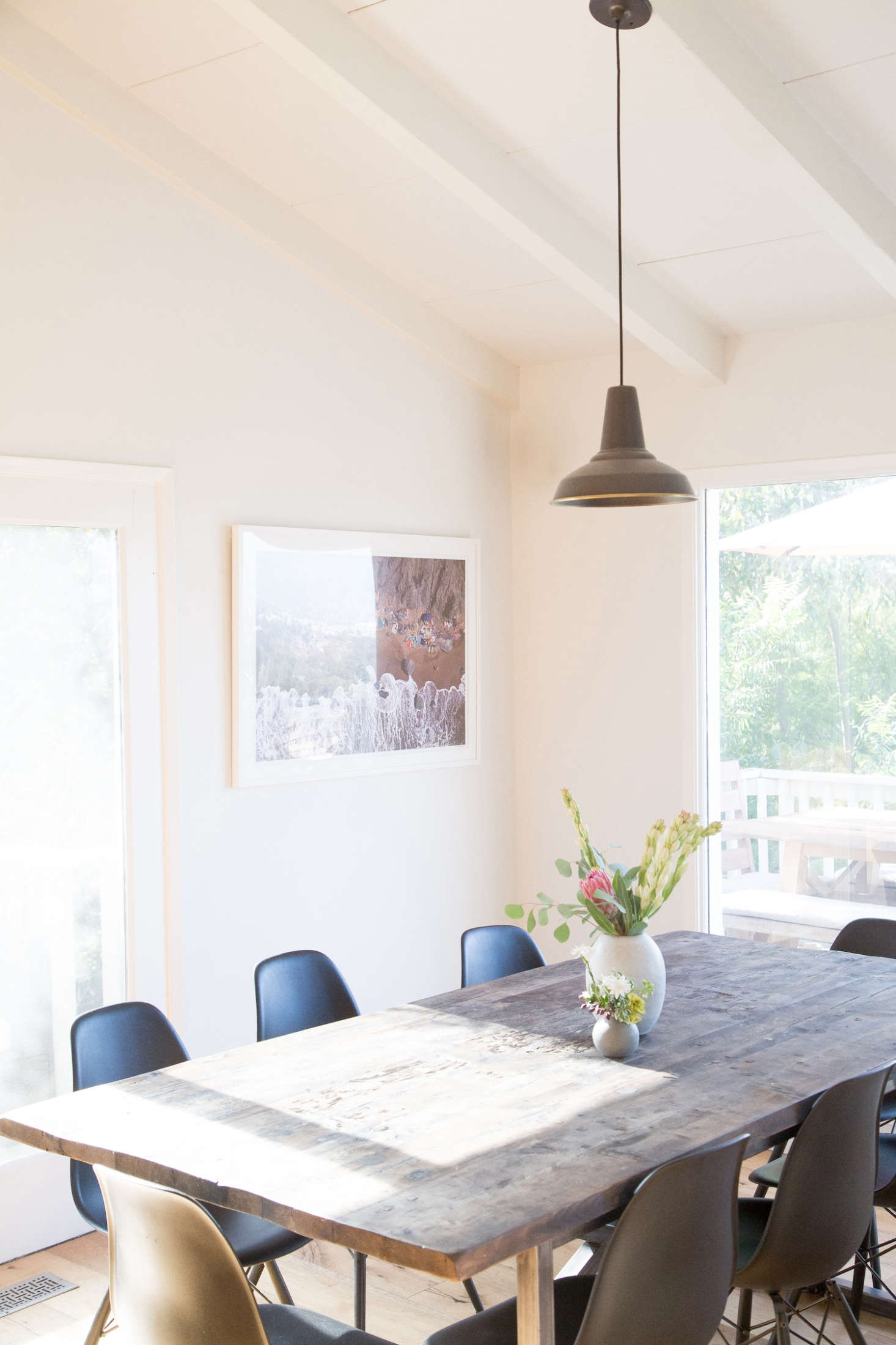 The wood dining table is from H. D. Buttercup.