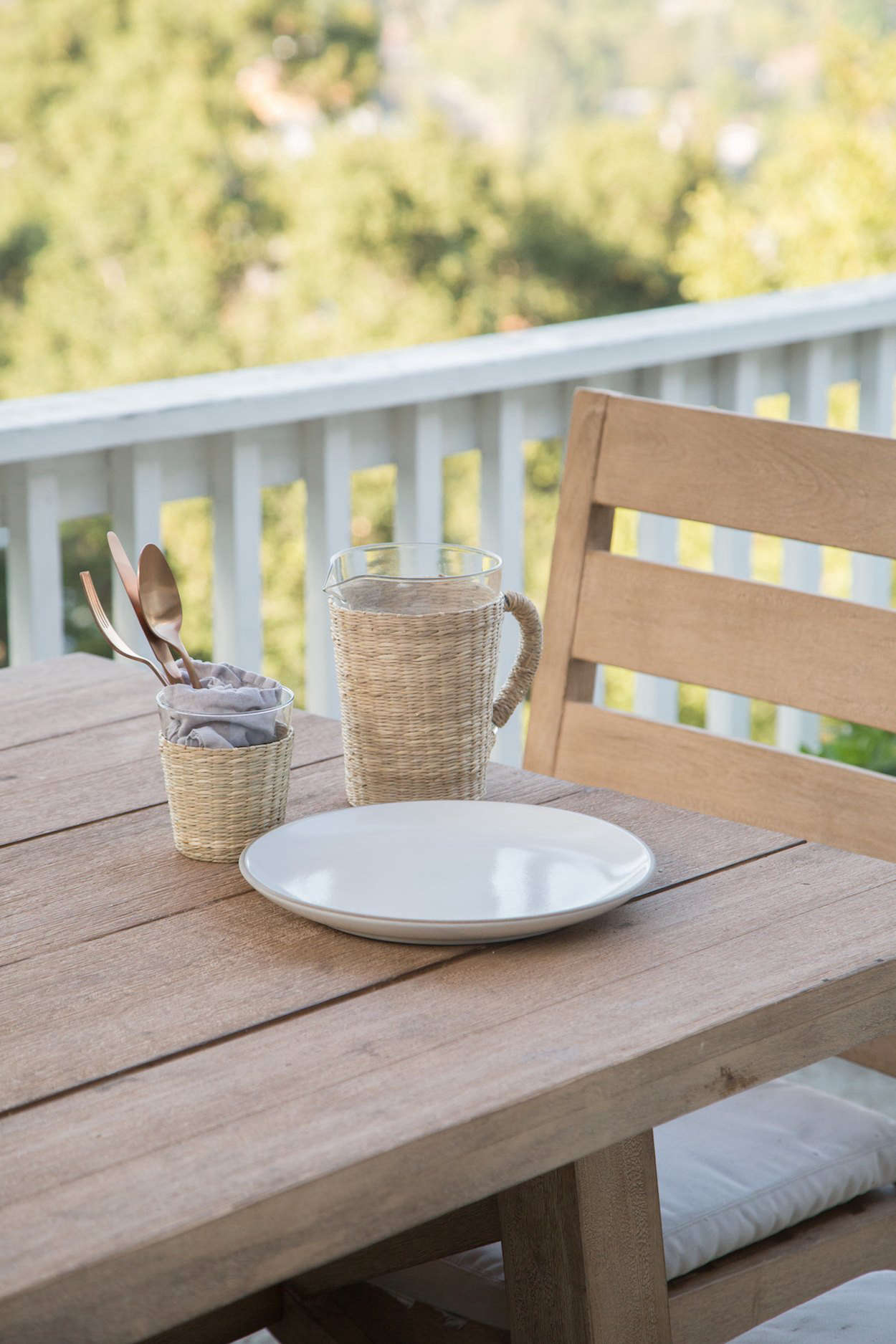 The house has dramatic views of the San Fernando Valley and the mountains, “which gives us a sense of natural respite,” said Hunter. Pictured here: a plate from Heath Ceramics and Oslo copper cutlery ($376 for a set of six) from Jenni Kayne Home.