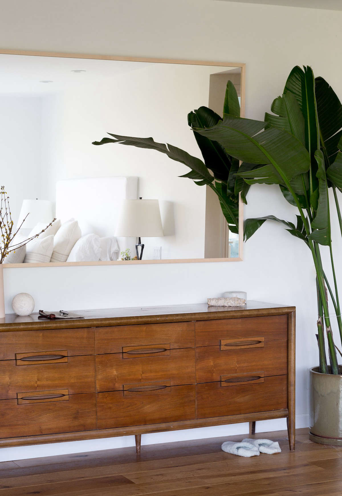 The vintage credenza, used as a dresser, is from Chairish.