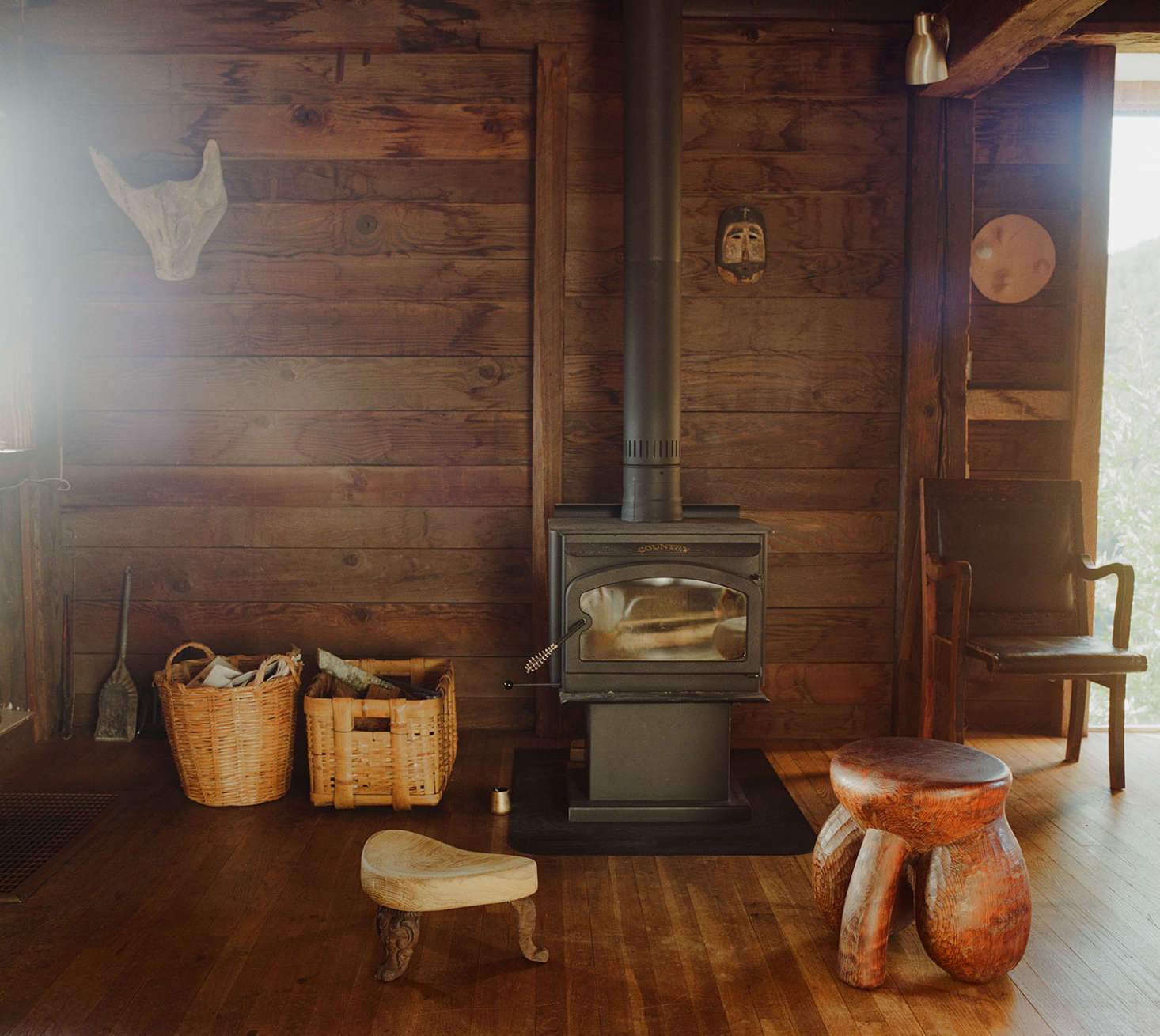 A woodstove heats the interior.