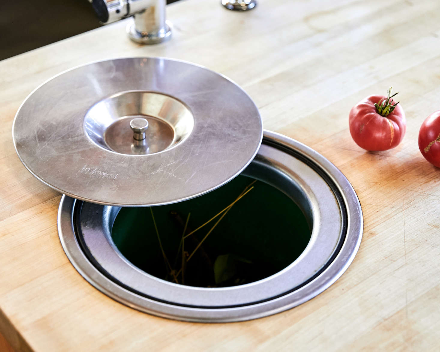 This being Northern California, “Most of my clients want some type of composting function designed into the kitchen,” said Anding. This stainless steel version is fully integrated into the butcher block countertop.
