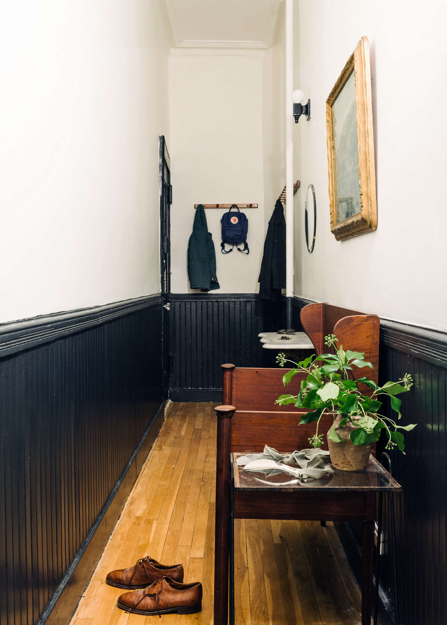 A Modern Fairy Tale Told In 800 Square Feet Sandeep Salter S Family The Hallway Baseboard Is Painted Farrow Ball Off Black In Full Gloss And Two