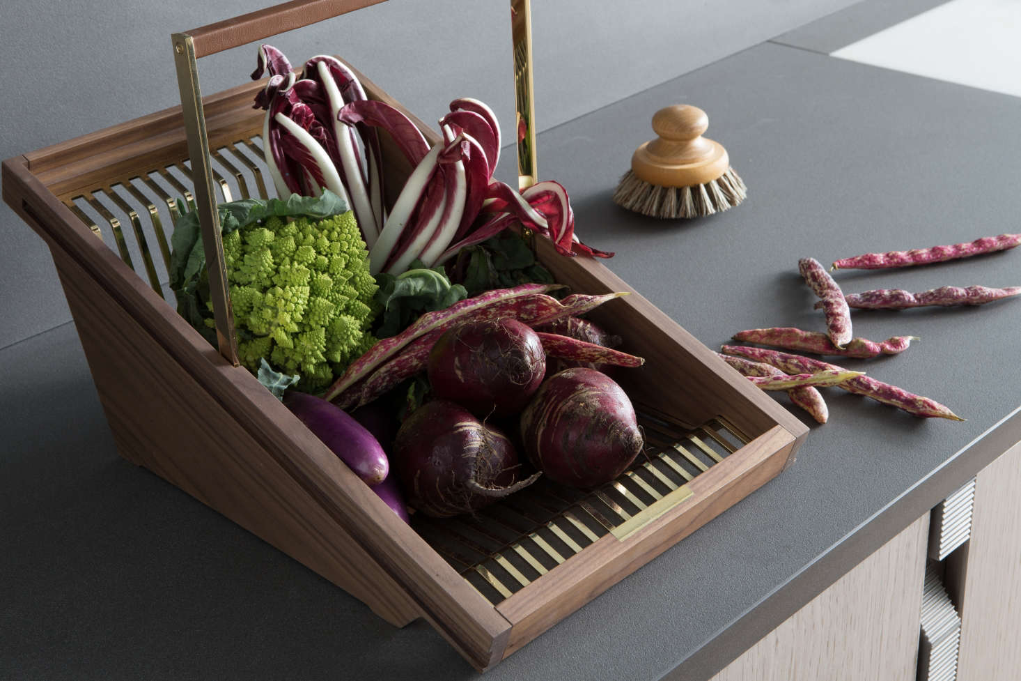 A refined version of the classic garden trug, Lanserring’s wood and brass baskets can go from garden to counter to fitted cabinet shelves, where they’re used as storage for perishables that don’t require refrigeration, such as apples, potatoes, and onions. (The showroom’s refrigerator, by the way, is in the pantry.)