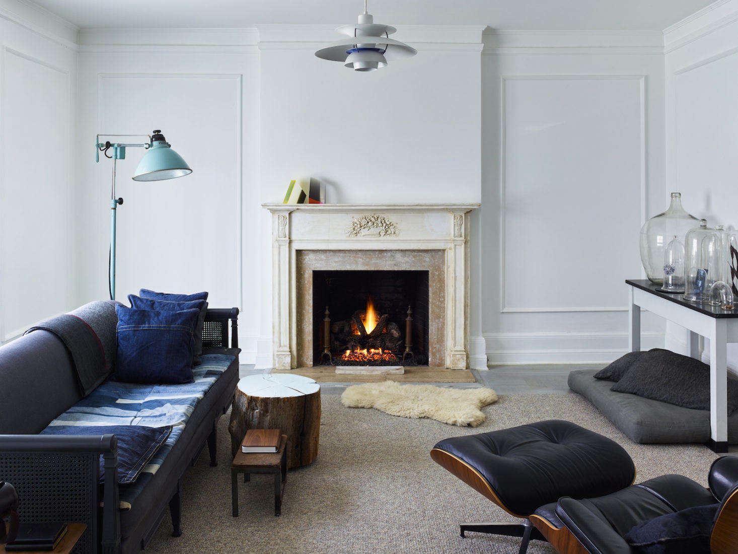 “I like the furnishings to build as time goes by,” says Axe. “I tend to make terrible decisions when rushed.” He and Hays enjoy hunting for vintage treasures: They found the sofa at a Goodwill store in Worcester, Massachusetts, and had it reupholstered with linen from the Garment District in New York City. The industrial turquoise floor lamp was a flea-market find. The Ph5 Pendant Lamp from Design Within Reach is just about the only piece that’s completely new in the living room.