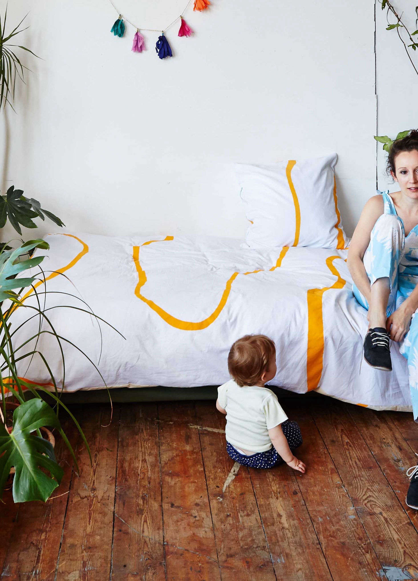 Vallentine and her daughter with the Psychedelic Behavior Quilt Cover, an earlier pattern. Many of her designs sell out, but she creates new stock several times a year.