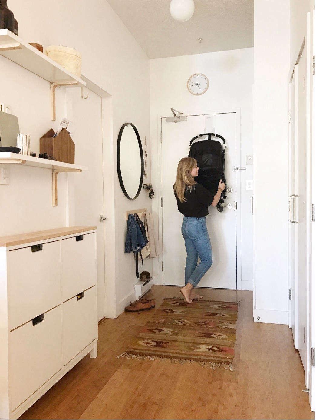 The tidy, spare entryway in small-space blogger Alison Mazurek’s Vancouver apartment. See how her family of four manages to live with less in 7 Things You Can Live Without in a Small Apartment, from Someone Who’s Been There. Photograph courtesy of Alison Mazurek.