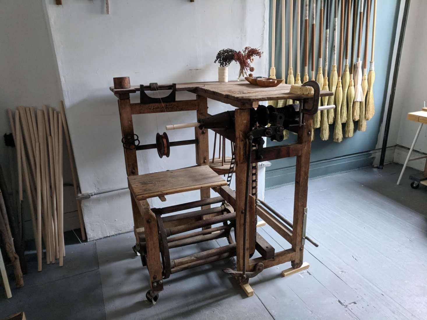 Erin’s 1890s kick winder broom machine.