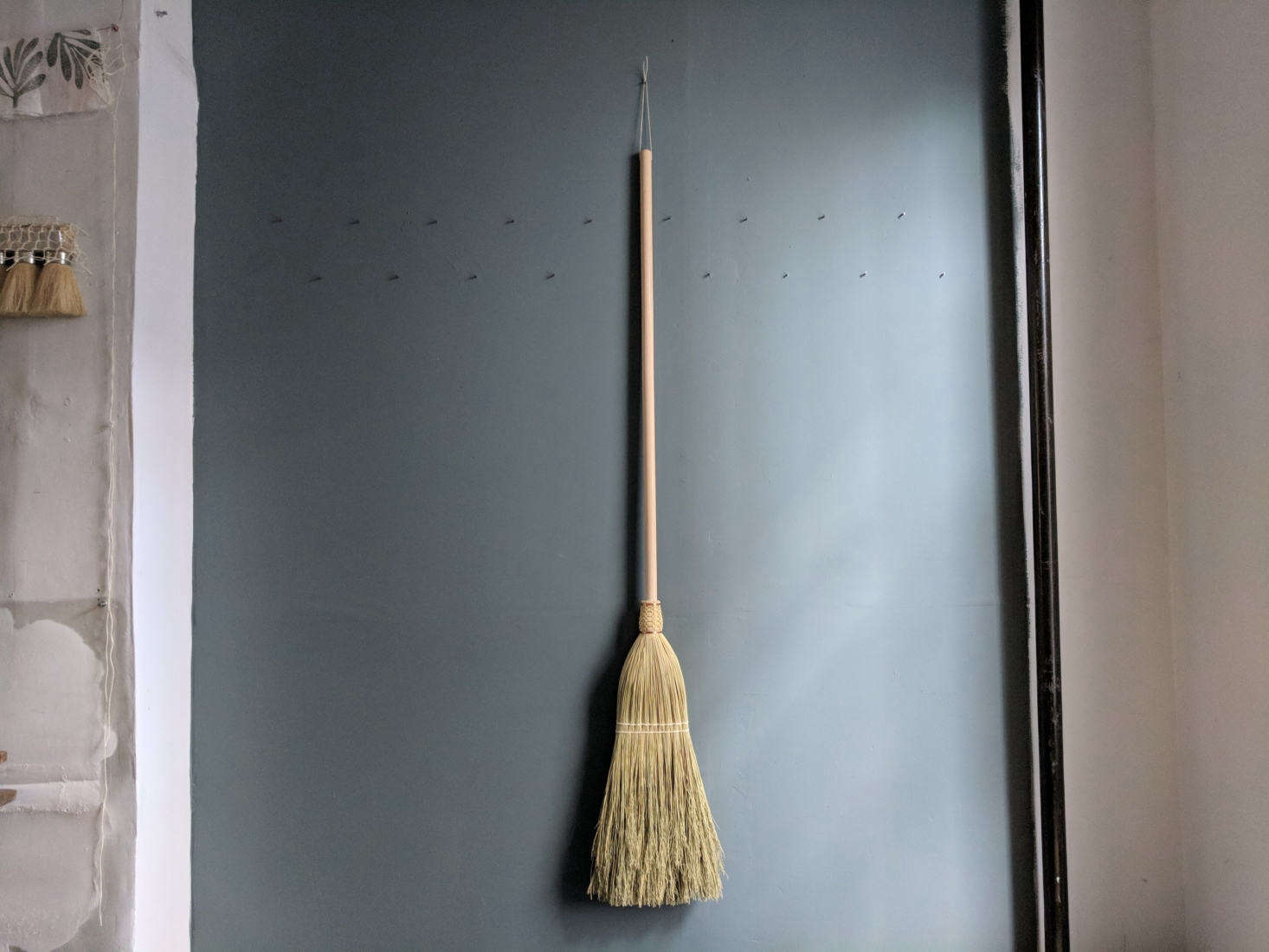 The Simple Broom has a maple wood handle treated with natural soap.