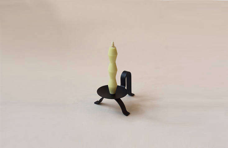 The three-legged Metal Candle Holder ($45) from Japanese retailer Saikai is “lightweight but sturdy and has a central spike to keep any tapered candle secure.”