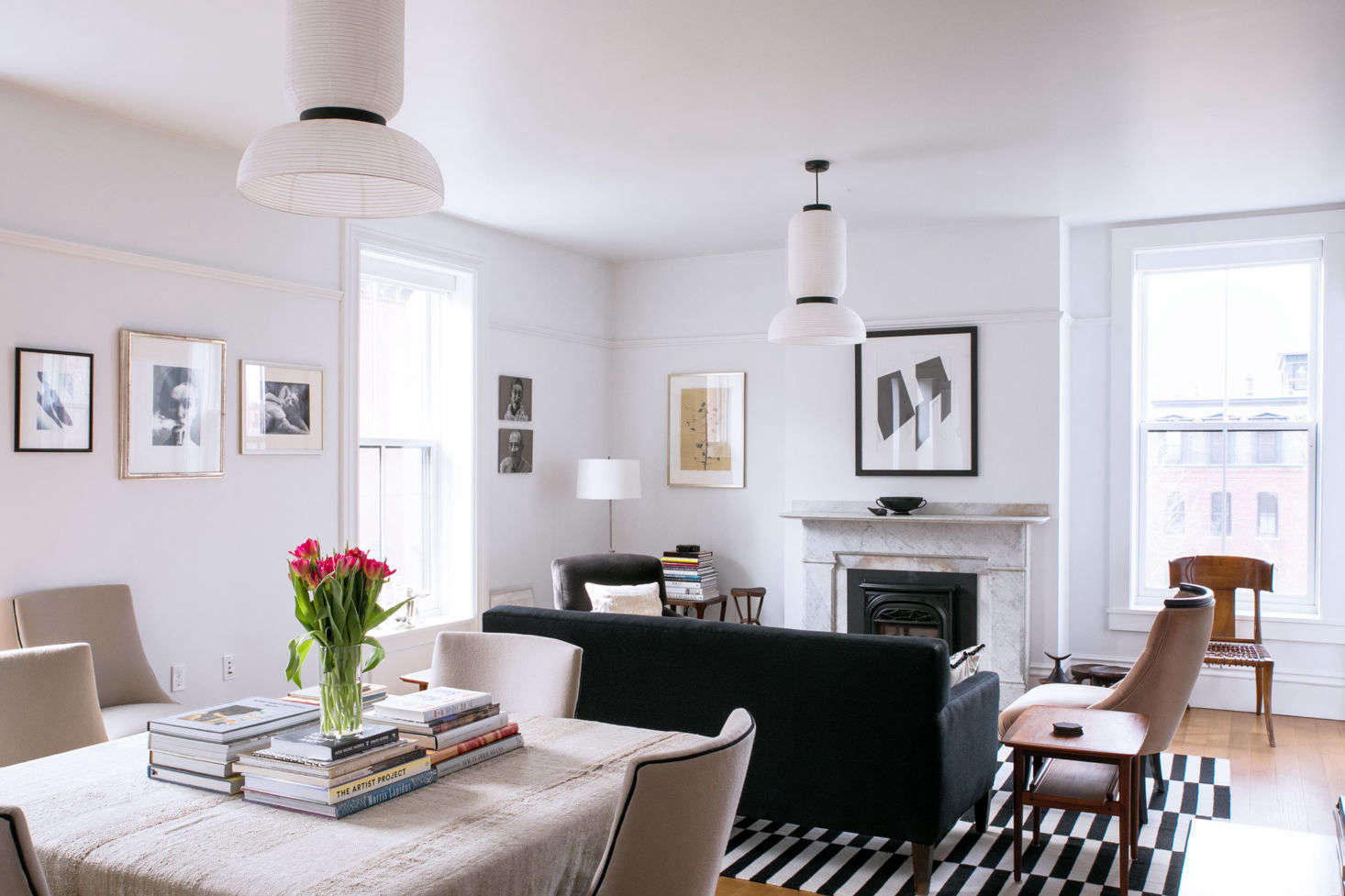 Light, reflected off the white walls and ceiling, gives the spaces a fresh, open feel.