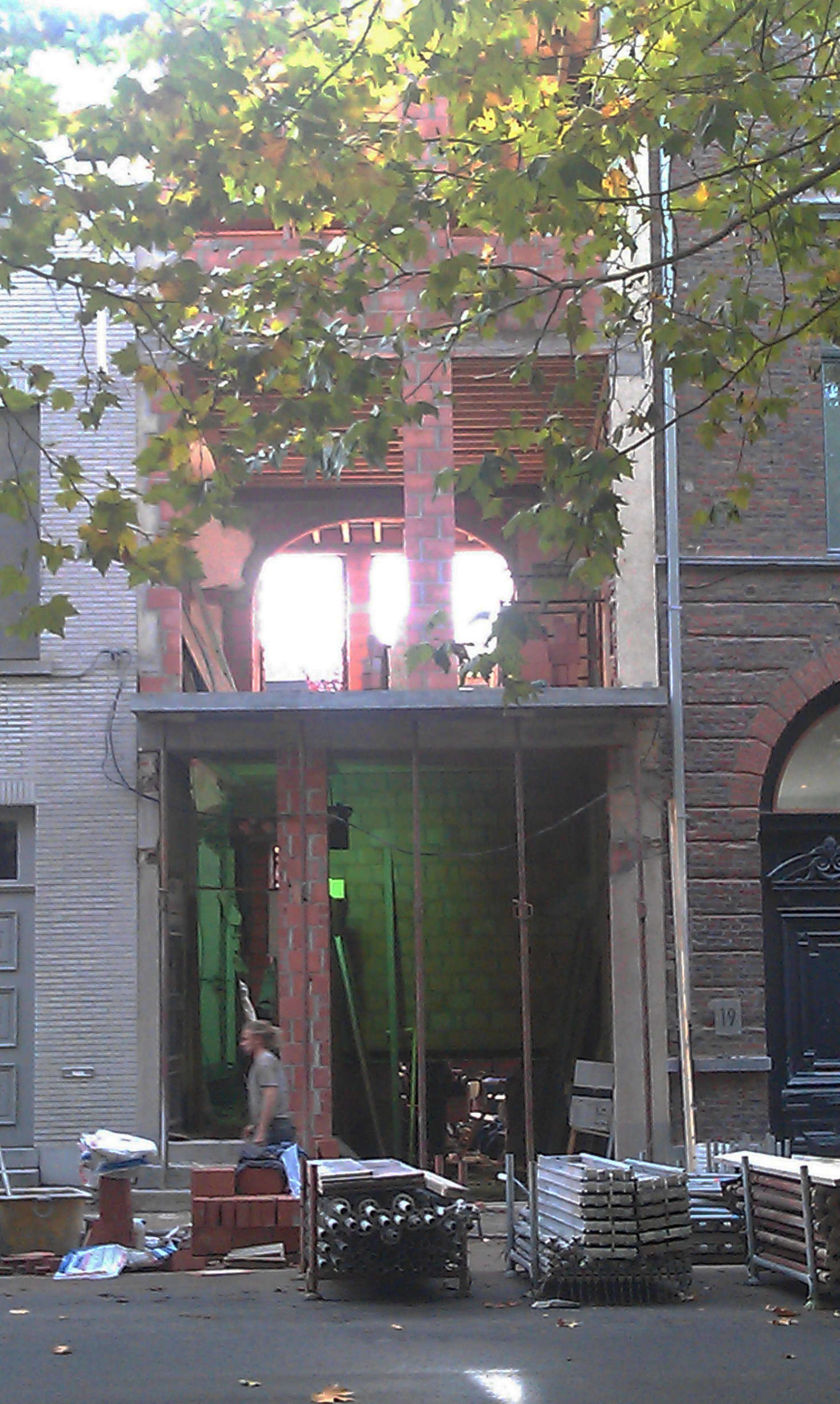 The project in progress. “We worked in phases,” Seghers says. “The existing floors were taken out only after the new floors were put in, the old floors acting as a free scaffolding holding the adjacent houses from falling in.” Photograph courtesy of Buyse Seghers Architecten.