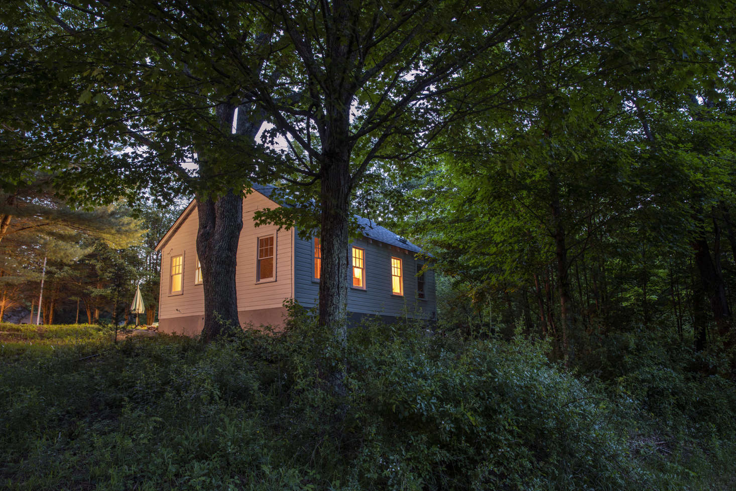A Glen Wilde cabin at night.