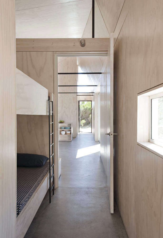 The house has three bedrooms, not including the bunkbed thoroughfare that’s just off the communal bath and master bedroom.