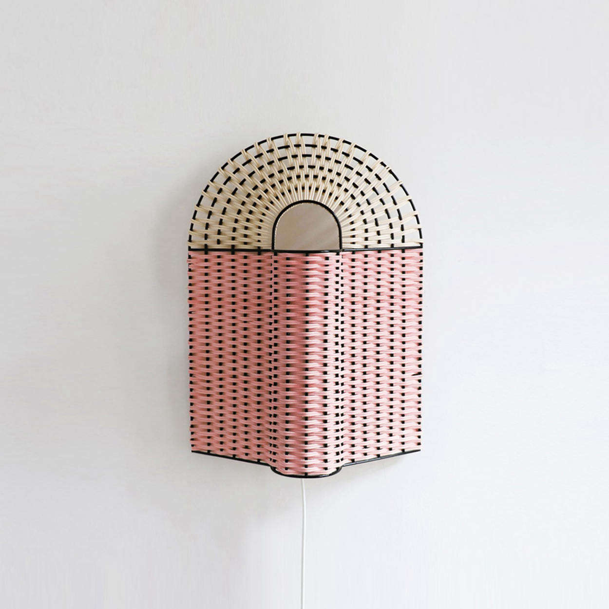 The Paon Medium Lamp in Pink and Natural is €335.