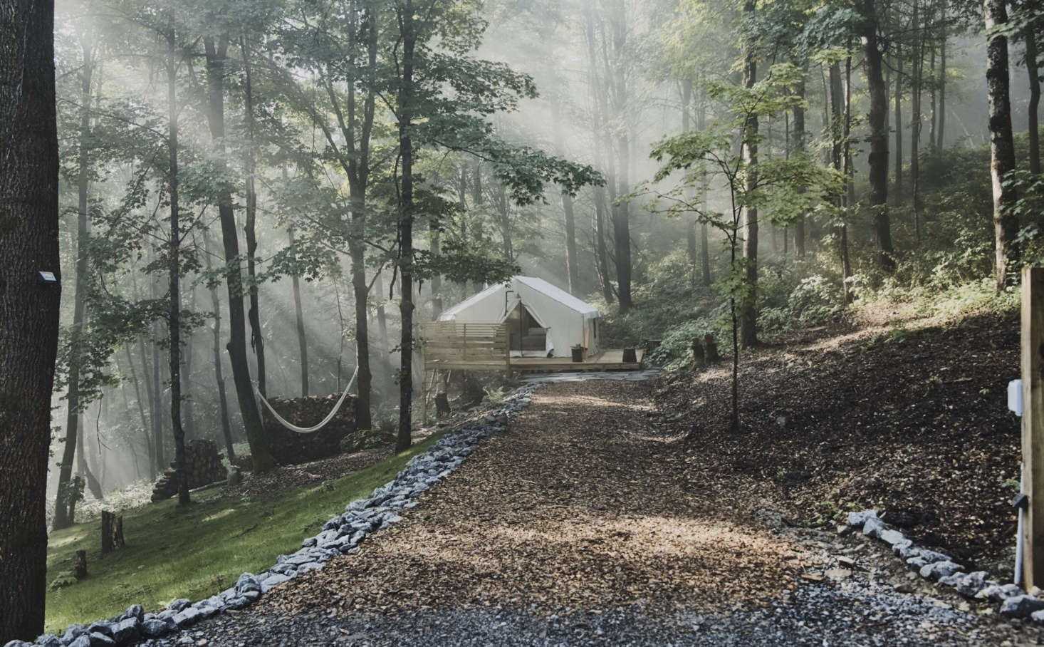 There are nine tent sites, each with its own hammock and wall of firewood. Solar-powered lights illuminate the paths at night. Photograph by Nick Bean.