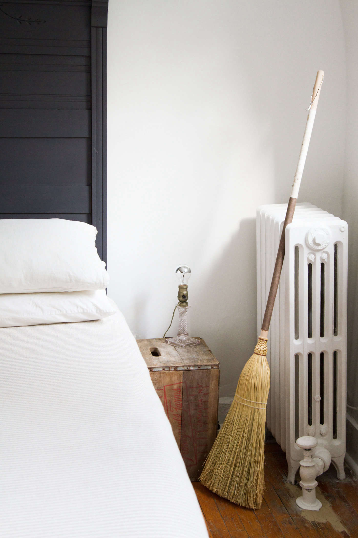 The Fabric Handle Broom is available in a choice of fabrics, including black or white silk (custom orders also available).