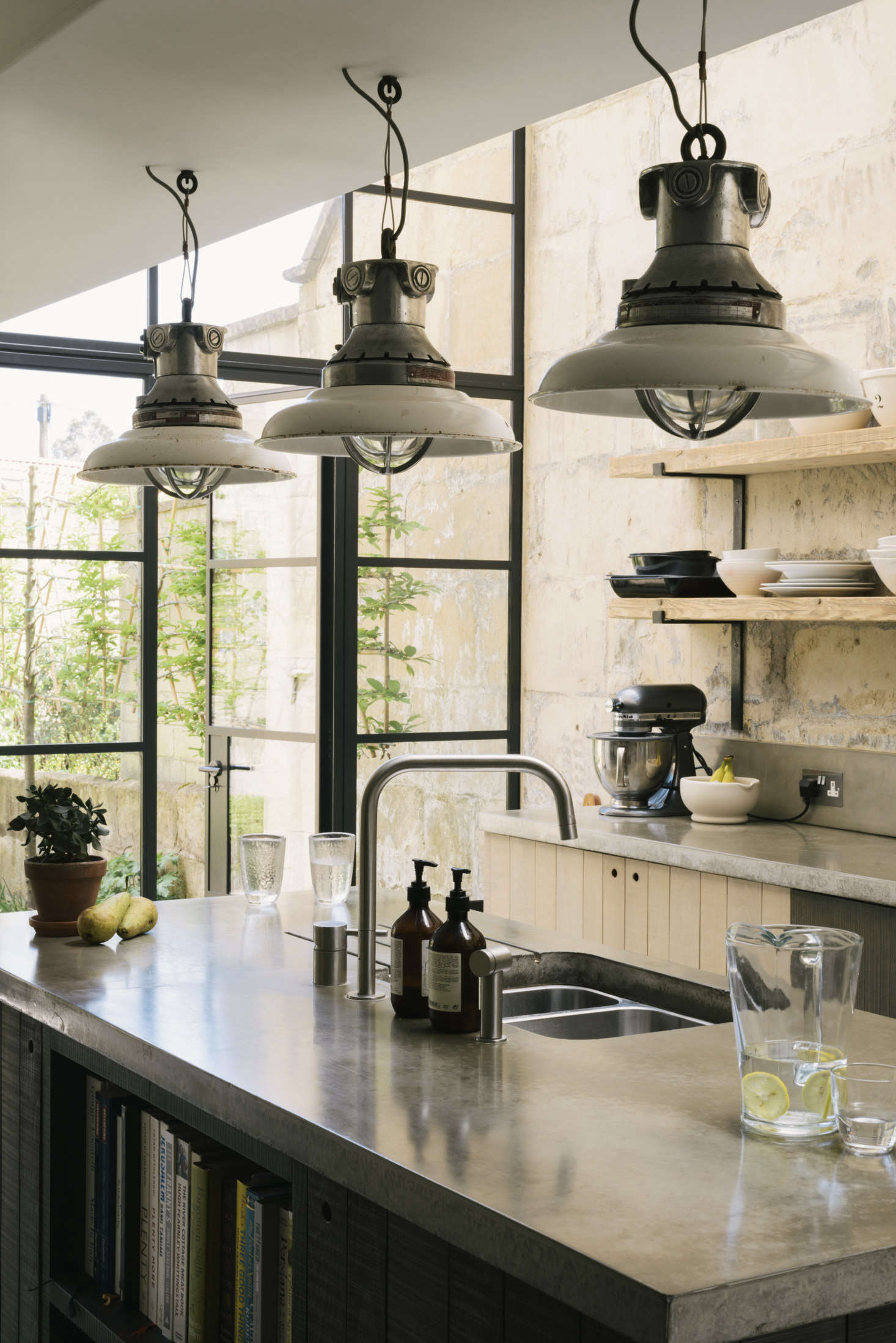 The brushed-stainless-steel undermount double-bowl sink and the F