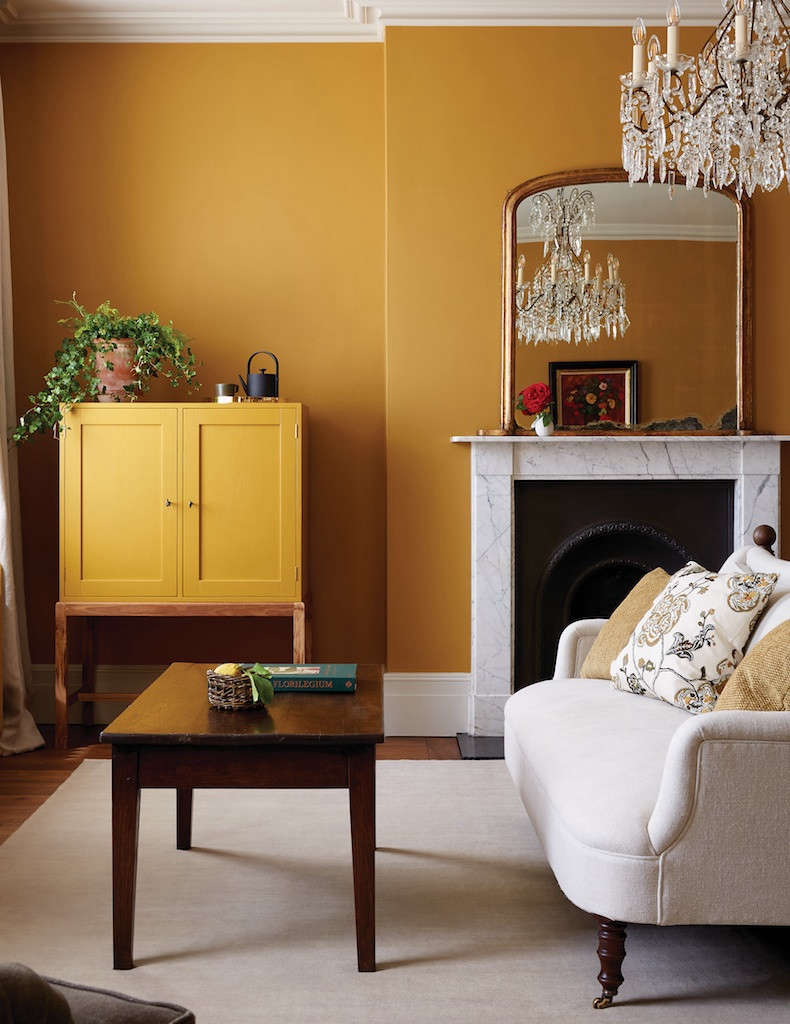 A fresh coat of ochre paint conjures an autumnal feel in this cozy living room at Heckfield Place. See: Heckfield Place: ‘Hushed Luxury’ in Hampshire, England.