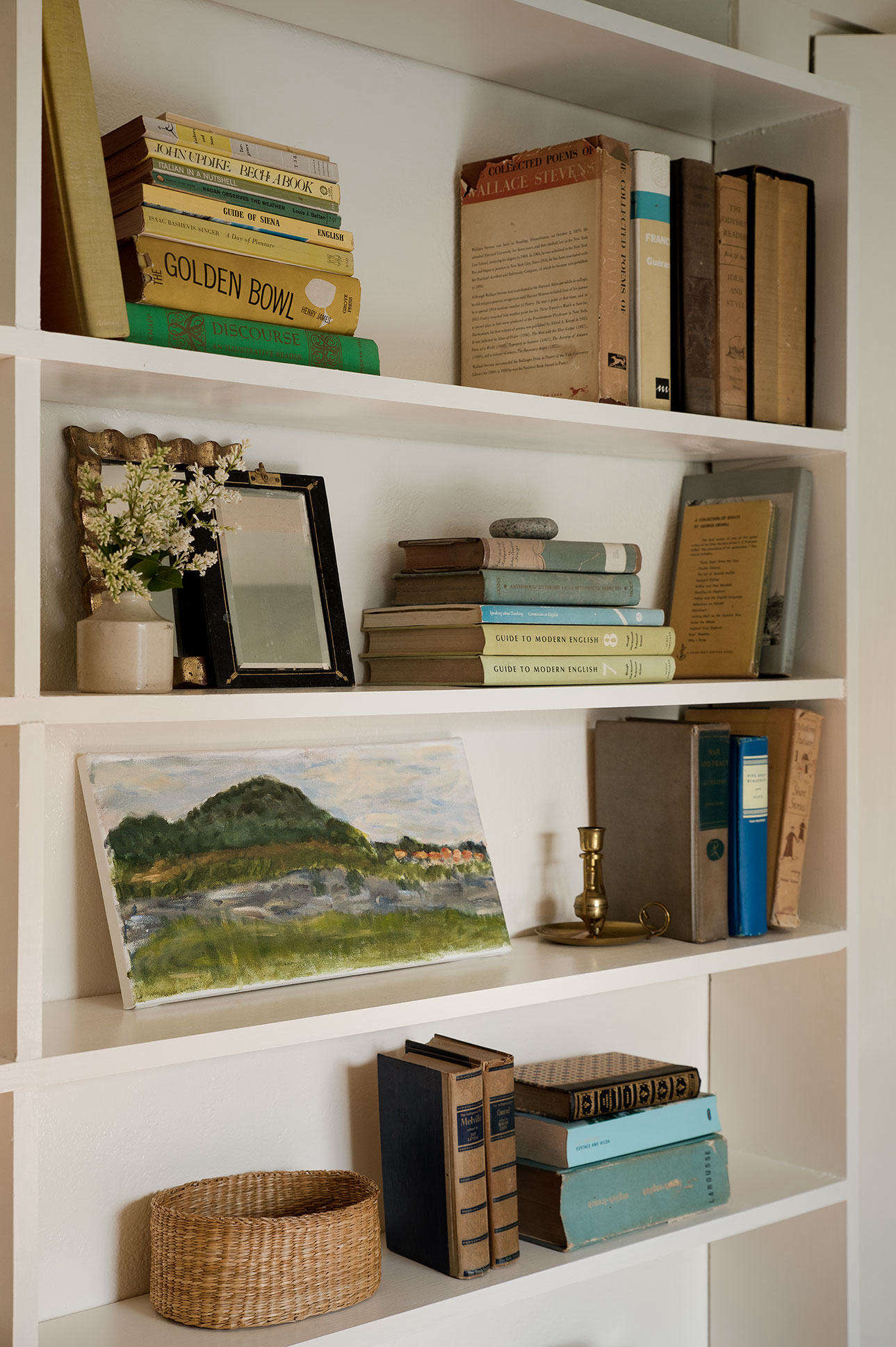 A few volumes and a landscape study by her daughter survived a decluttering bender in Julie