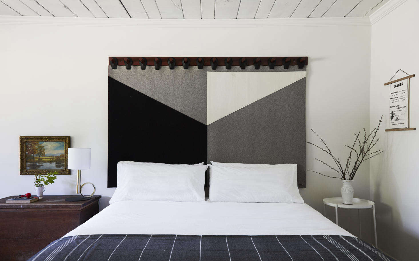 Each room has a different headboard pattern. The sheets are from Brooklinen—see Bedding Disruptors: Luxury Linens for Less—and the mattresses are by Luft. The couple unearthed the 70s snowmobile race posters in the attic when they were insulating.