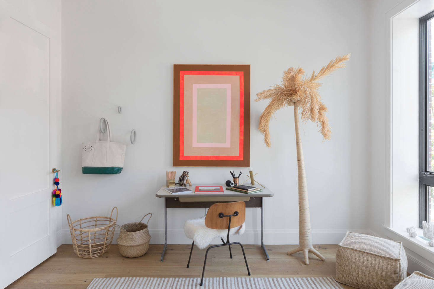 A playful teen room in Park Slope’s Park Court Townhomes. The Raffia Palm, currently marked down from $120 to $60, is from Jamali Garden in NYC’s flower district, where the Hoveys source most of their plant pots and baskets.