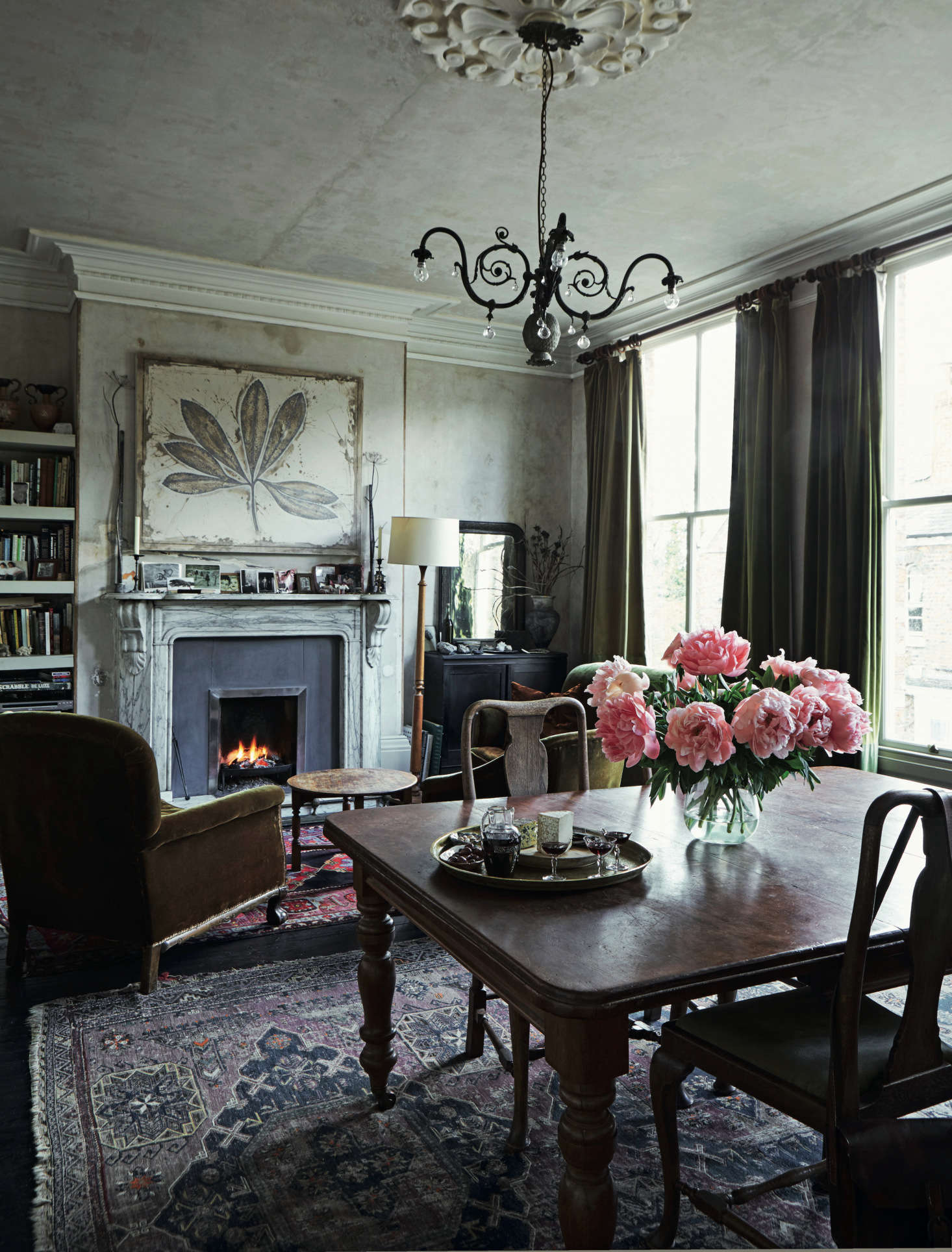 There’s a grand living room on the second floor; its three tall windows are what sold Anita on the house.