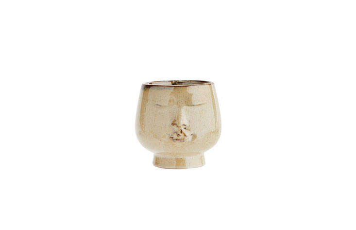 The Glazed Ceramic Peaceful Face Flower Pot, also by Rockett St. George, is a more demure option; £14 from Liberty London.