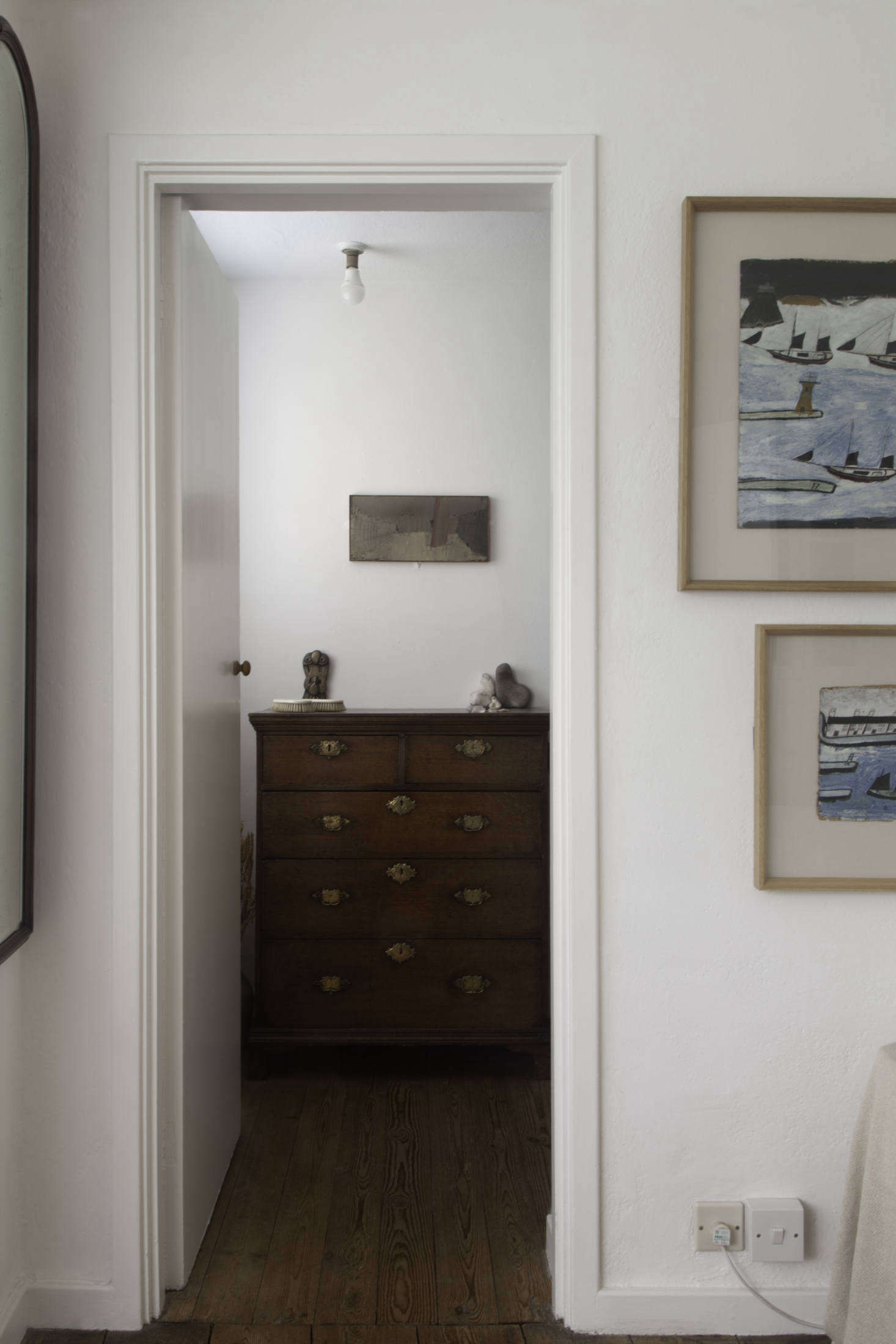 The Henri Gaudier-Brzeska brass Door-Knocker sits on the dresser. On the wall is Piazza San Marco no. 5 by William Congdon.
