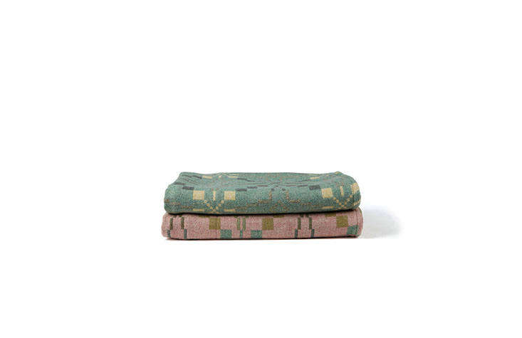 The Vintage Star Throw in Mint (on the top) and Blossom (on the bottom) are reproductions of a 50s design, both available from Another Country for £9. (The pink version is also available from Rowen & Wren for £0 and from Cb