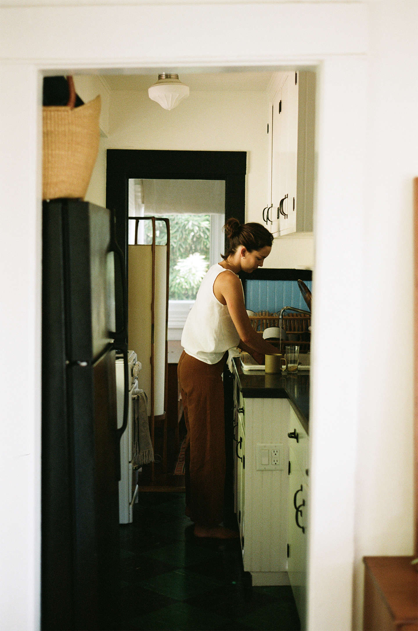 There are only two interior doors in the house and they lead into the bathroom. Throughout the rest of the house, one room leads directly into another: including into the bedroom.