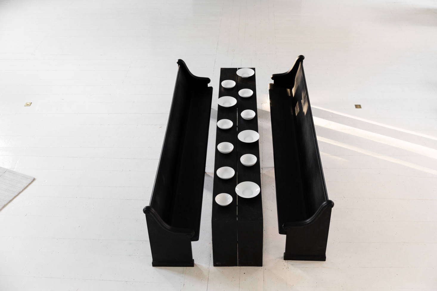 The long table, set for dinner. McNeil currently has one artist tenant: 