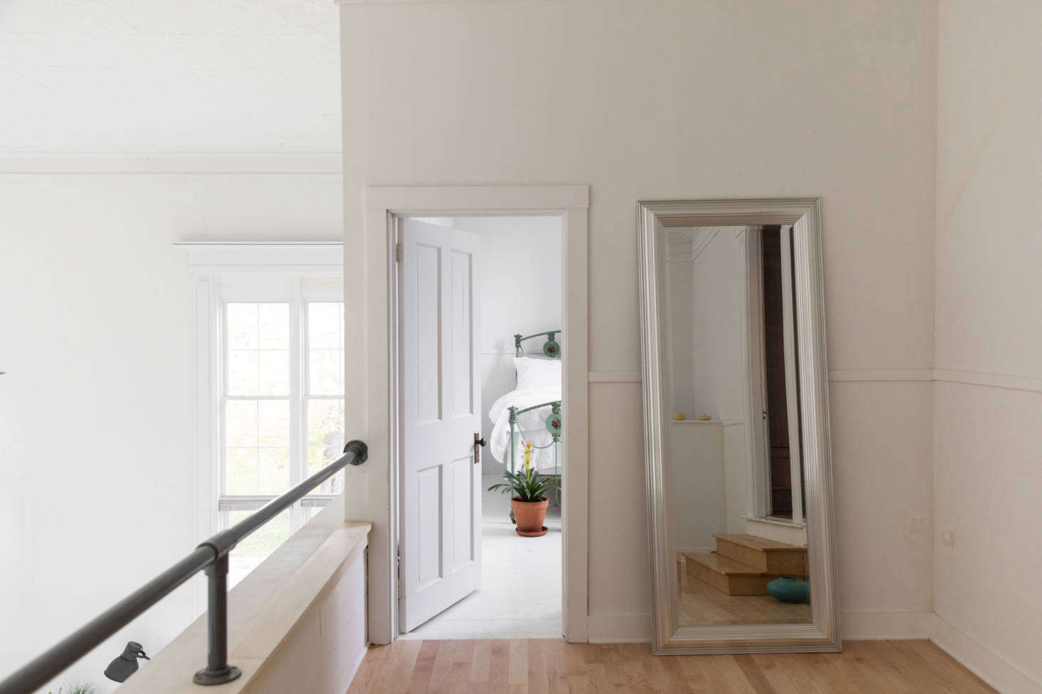 Upstairs on the landing, looking into the third bedroom.