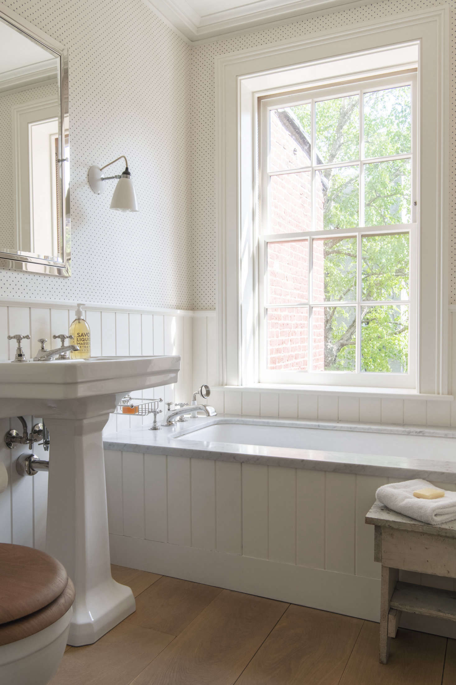 The 0ld-fashioned look continues in the children’s bath. “Our clients’ kids are young and like to splash,” says Lekwa, “so to keep the tub surround from falling apart, it’s milled out of PVC: when carefully hand-painted, even I can’t tell the difference.”