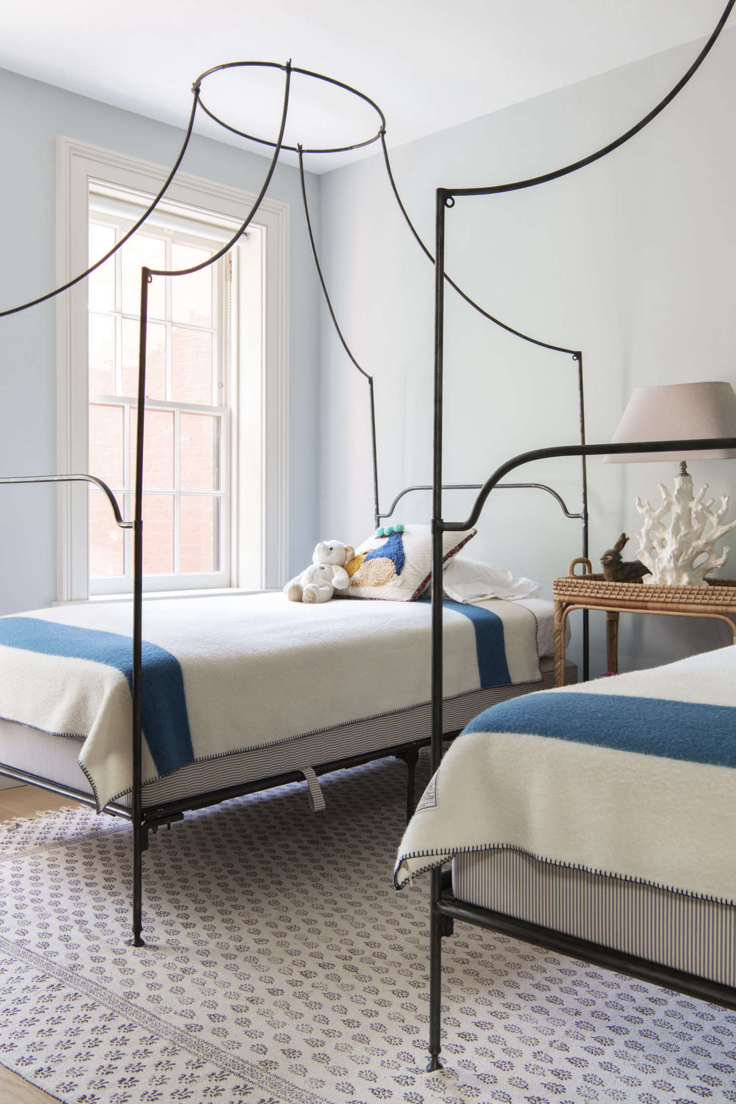 Campaign canopy beds from Anthropology (since discontinued) came out of storage as temporary furnishings in one of the children’s rooms. The blankets are by Woolrich and the carpet is from Urban Outfitters.