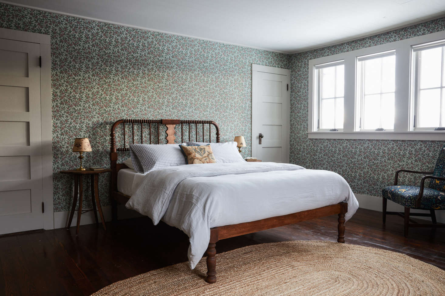 The Jill guest rooms feature wallpaper from Bradbury and Bradbury. Percy fashioned the bed for this room, as well as the adjacent Jack room, by using the head and foot boards of a vintage Jenny Lind bed.