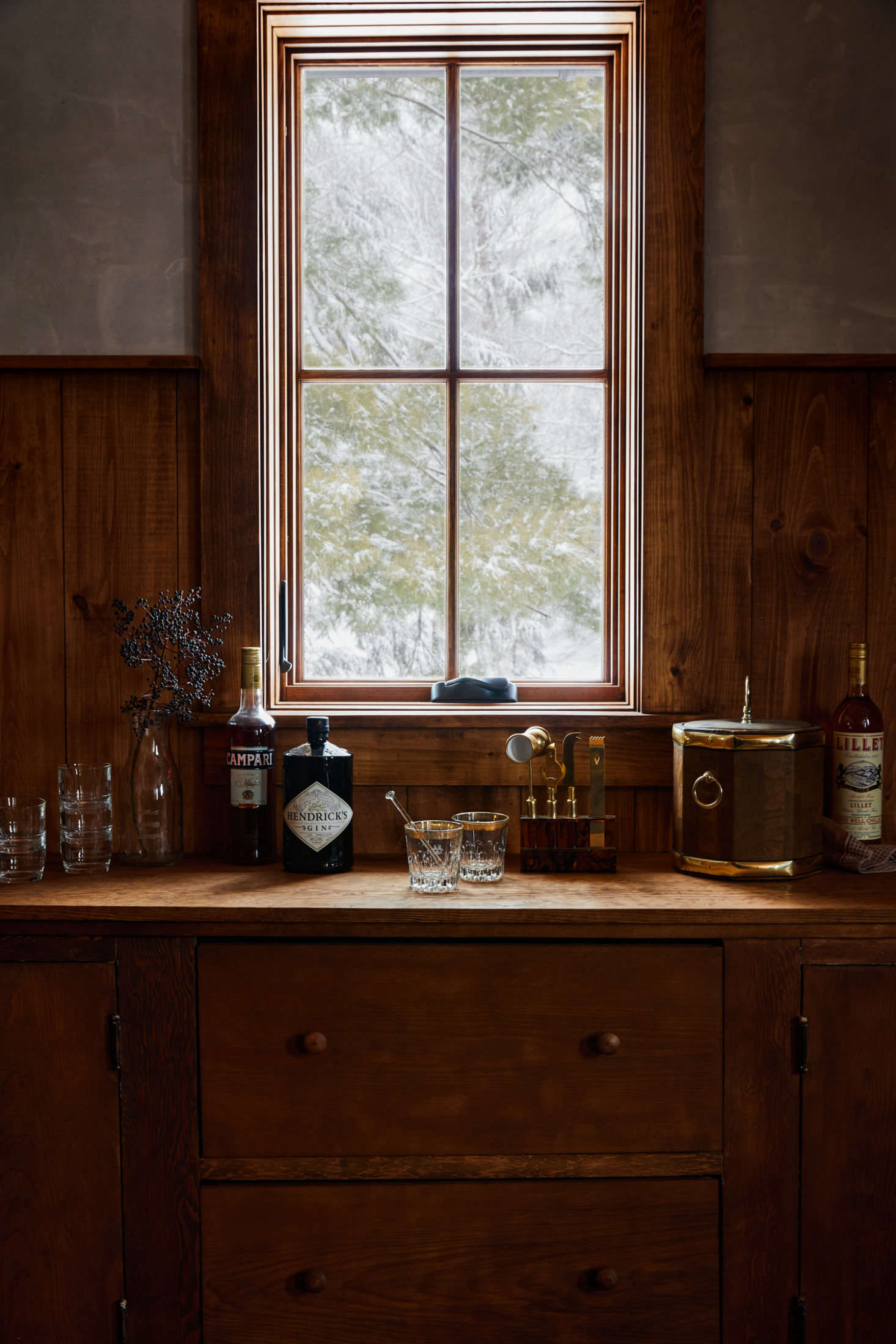 Though it looks original to the house, the bar in the groom