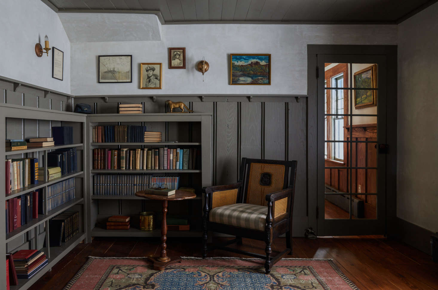 When the couple purchased the home, they found many bits of ephemera, including old photos and books that now occupy the home