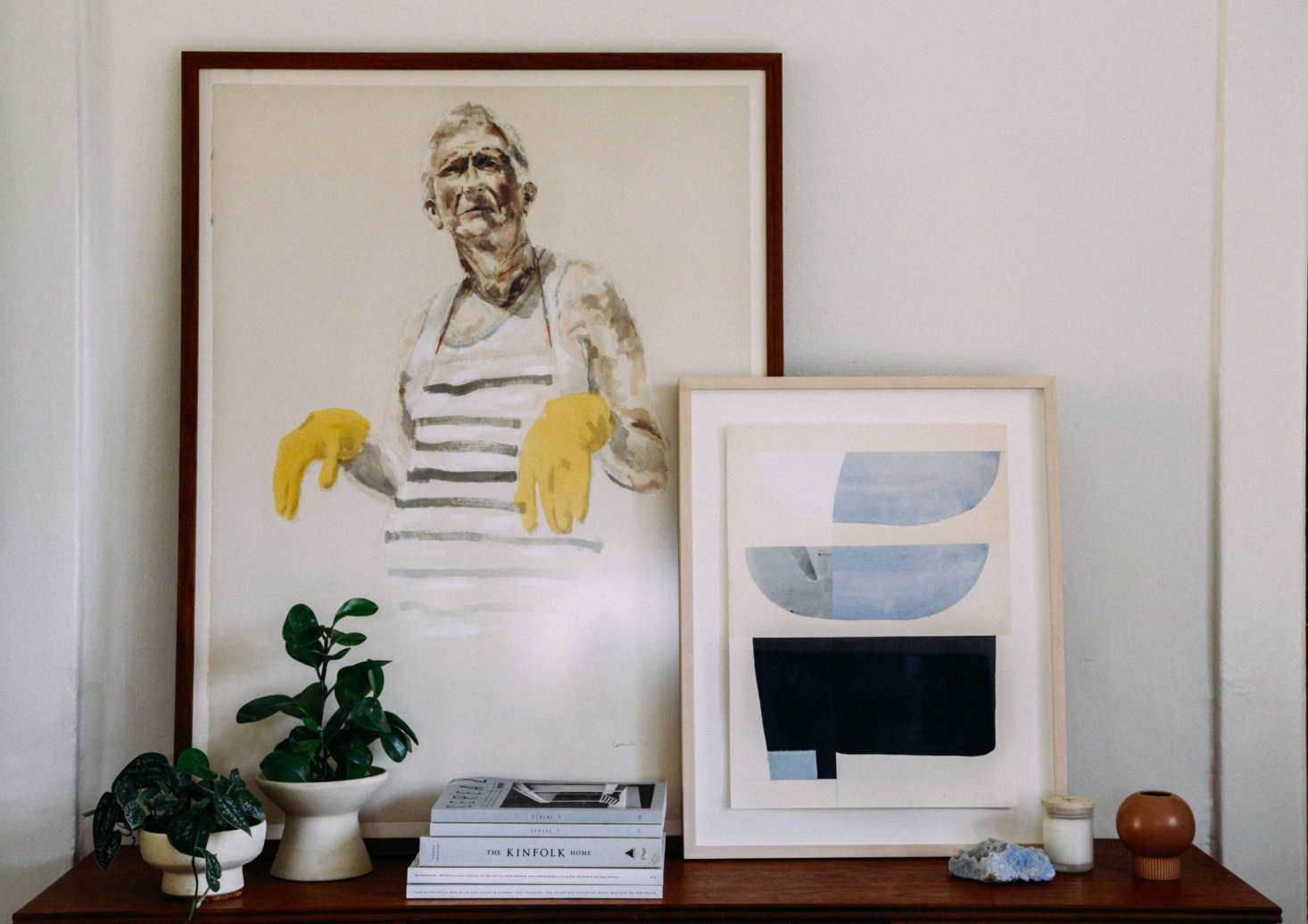 For renters, leaning artwork against the wall means no holes to patch later, and makes it easy to switch out pieces anytime.