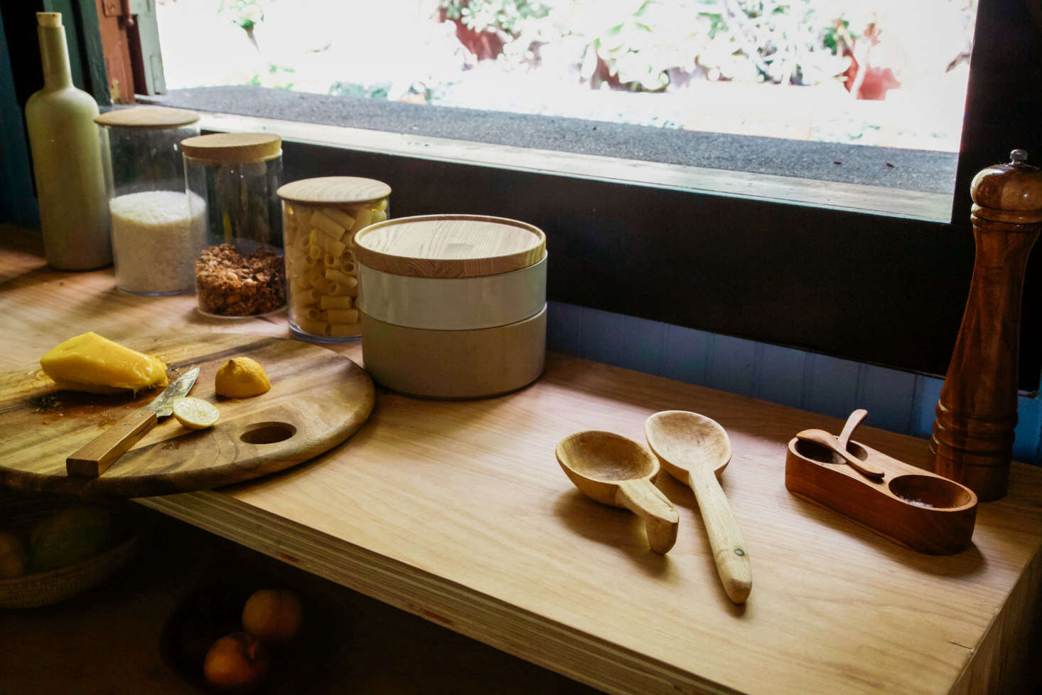 A close-up of the DIY table in the kitchen that Jodi and Alex use as a prep station and for storage.