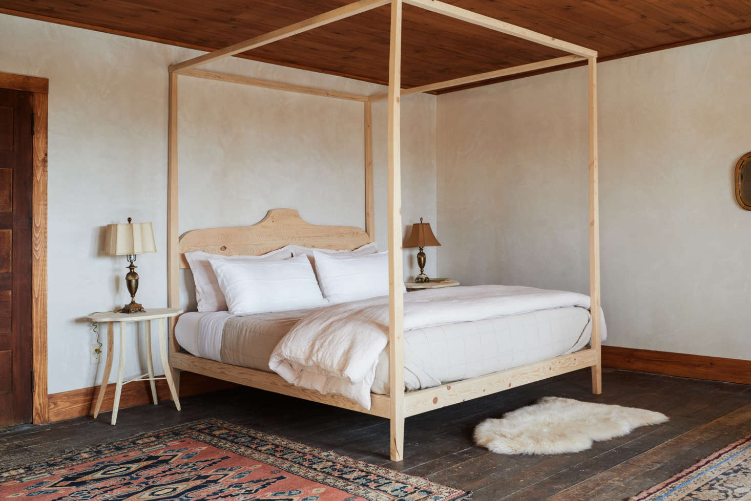 Upstairs, the generous master or bridal suite features a custom-made bed by Percy.