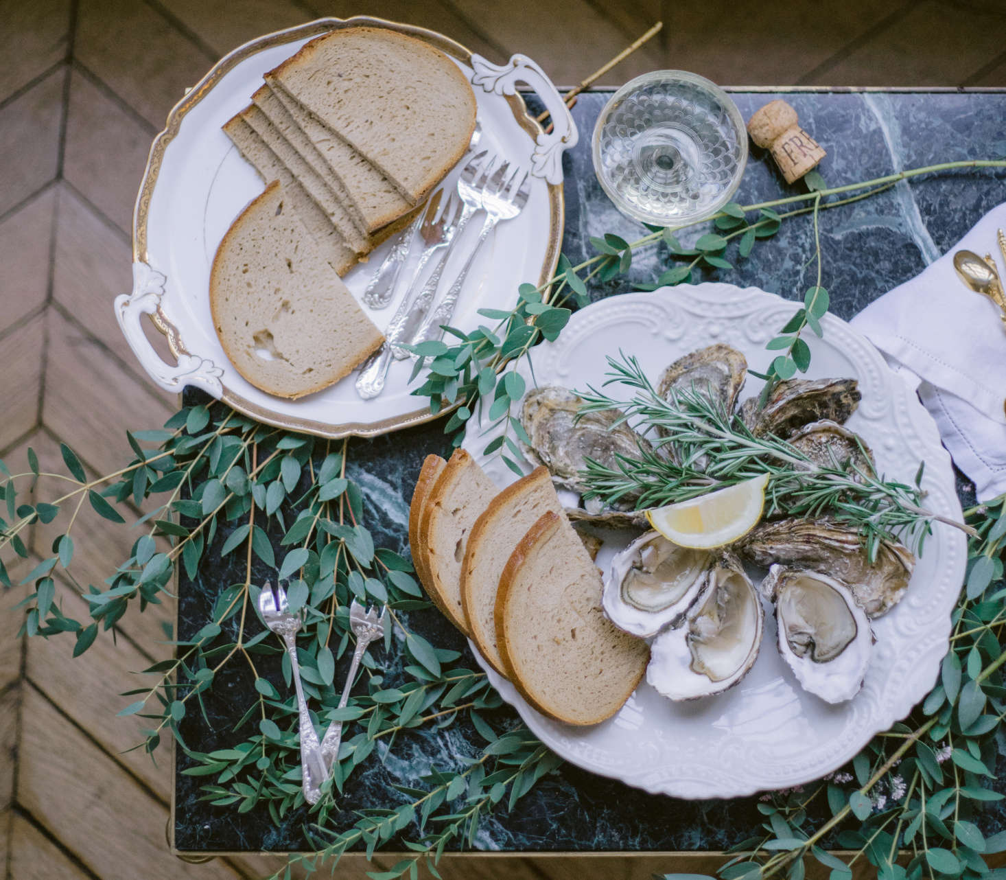 Platters of oysters, greenery included.