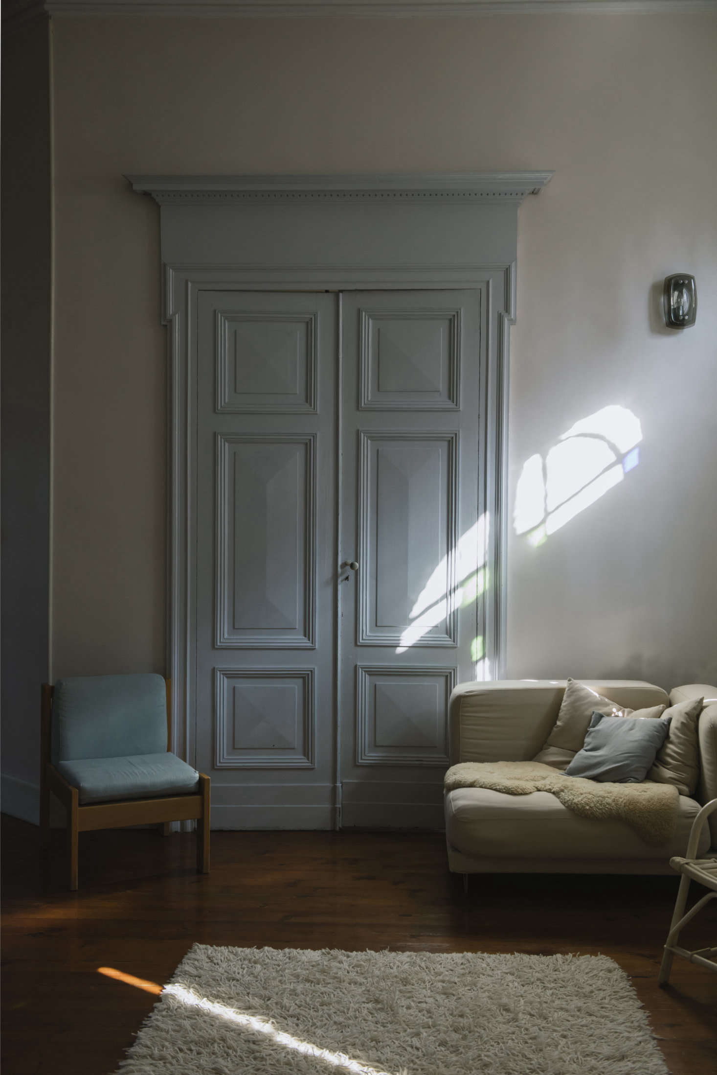 The double doors off of the living room, late in the day.