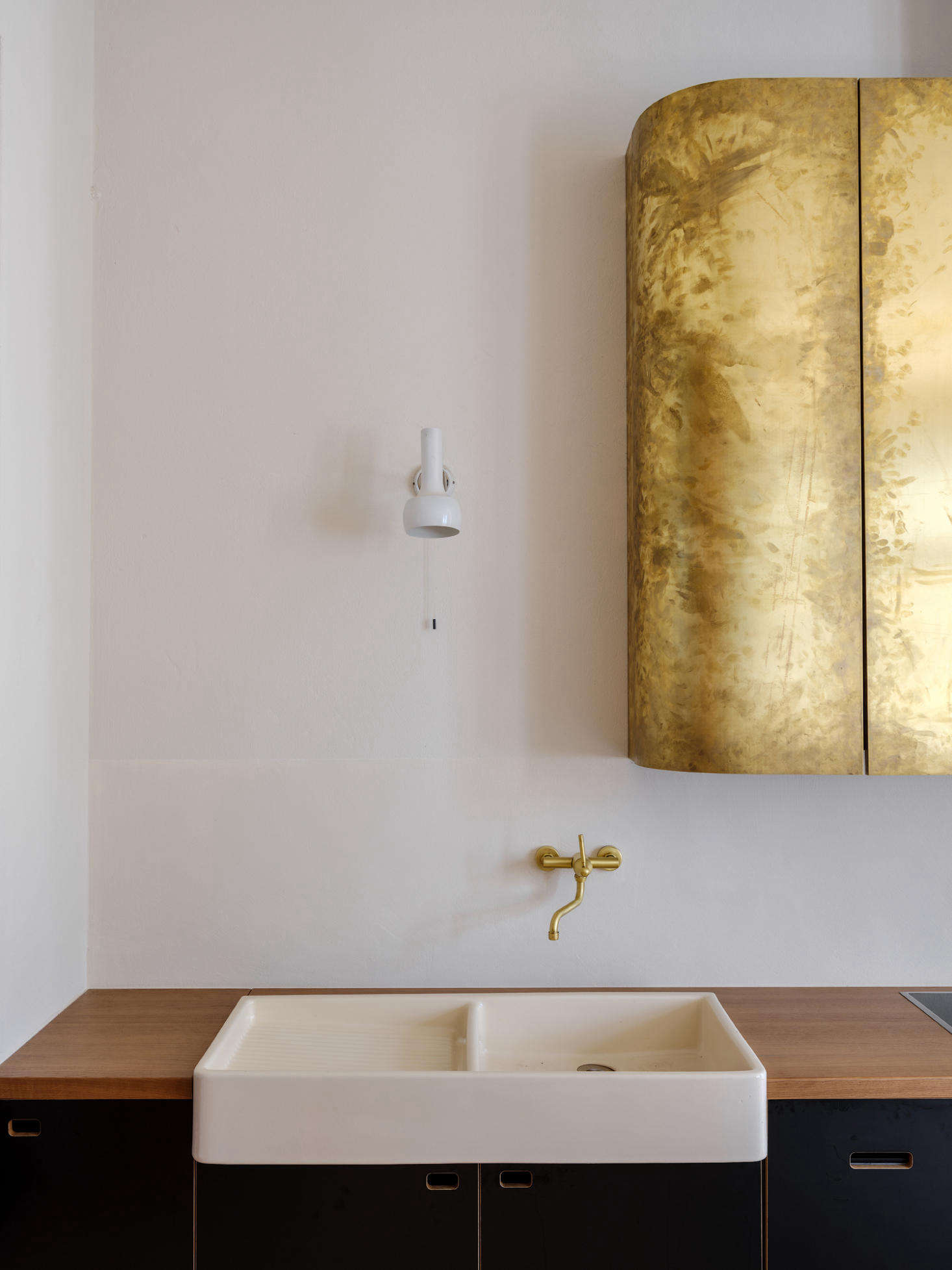 Wilkins moved to Kiev from Berlin and shipped his favorite belongings by moving truck, including this 1950s Swiss porcelain double sink. It had come out of his great grandfather’s townhouse, where at one point it had been used in a darkroom. He found it languishing in the basement, and his family thought he was crazy for keeping it. “I had it in my last apartment but it needed more breathing room. Emil designed the kitchen around it.”