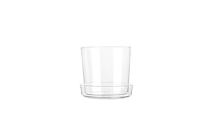 A Glass Flower Pot, made of borosilicate glass, has a small hole in the bottom for drainage and a saucer to collect water, but could also be used for kitchen or bath storage. It’s 150 SEK from Arket.