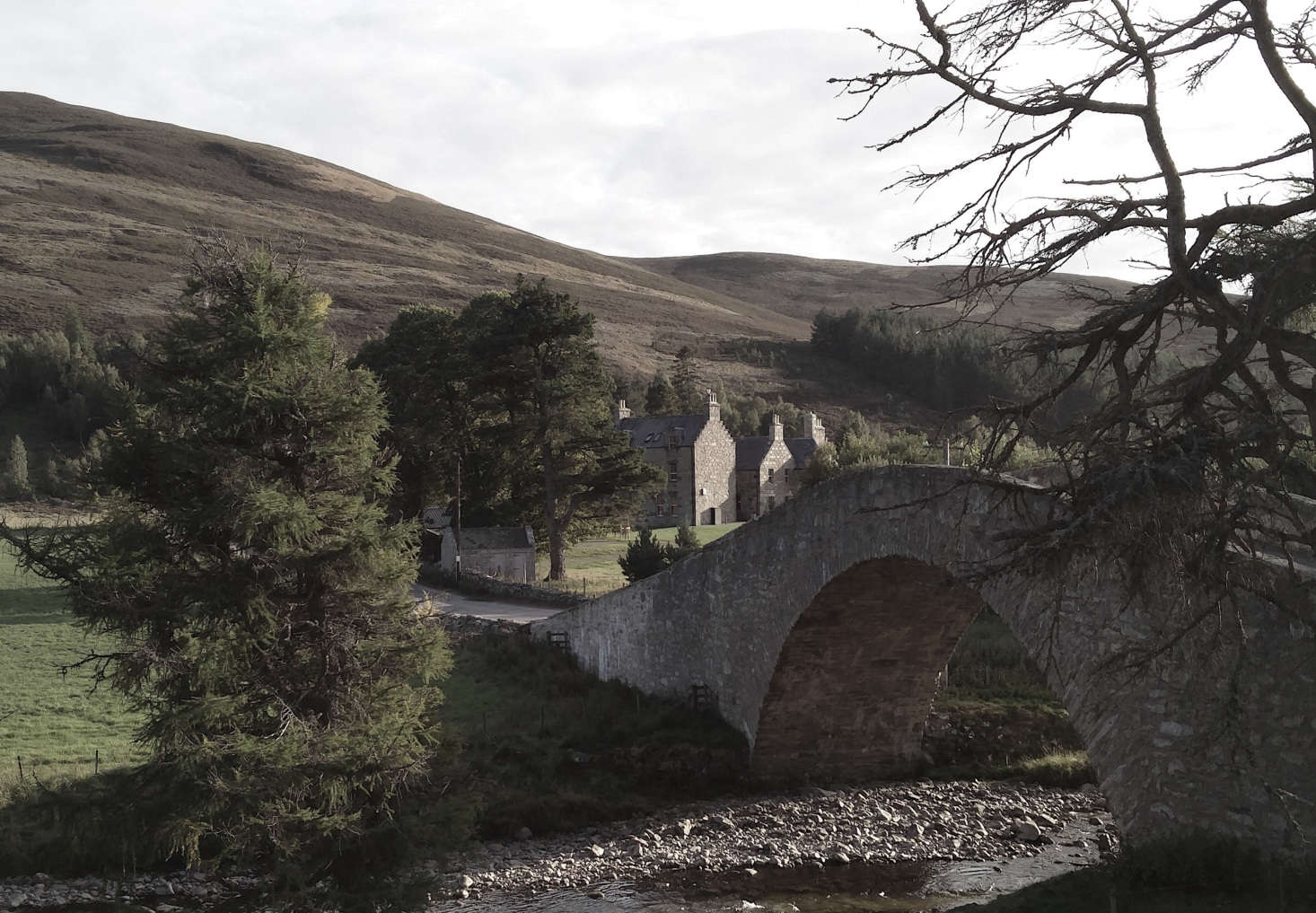 The Gairnshiel Bridge was built over the River Gairn in the 18th century. There are 20,000 private acres surrounding the lodge and beyond that is parkland.