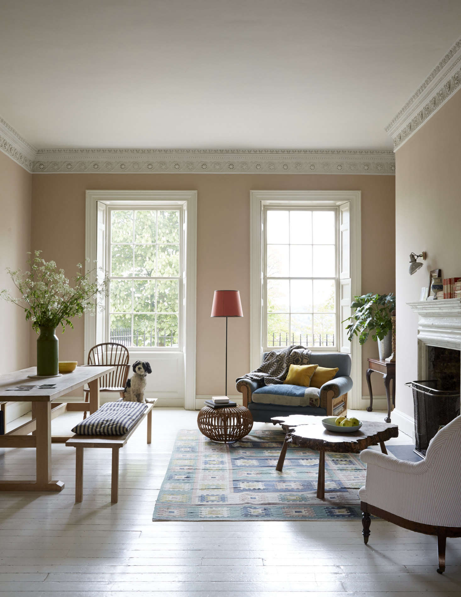 Painted a slightly different Farrow & Ball pink called Dead Salmon, the other half of the room is set up as a combination eating area and hangout. Harding had the trestle table and bench fabricated by a local carpenter.