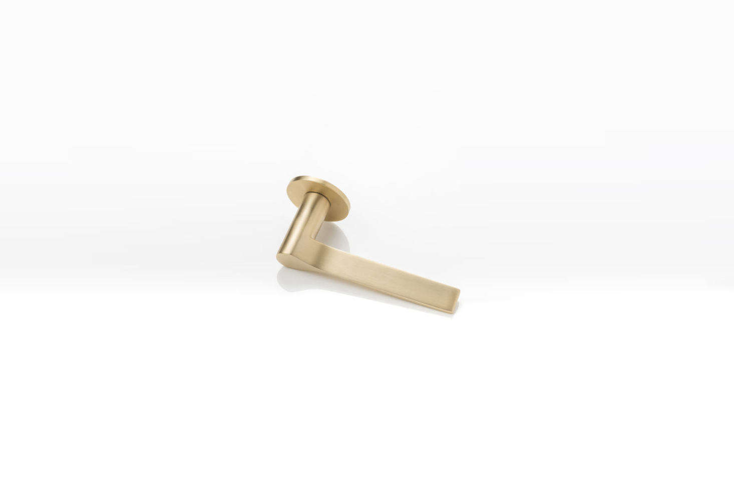 The Joseph Giles LV1045 Fonteyn Solid Brass Lever Handle with a unique rota-bearing sprung rose is available in Brushed Brass Waxed (shown), Polished Wax Brass, and Mid Antique Brass Waxed. Contact Joseph Giles for price and ordering information.