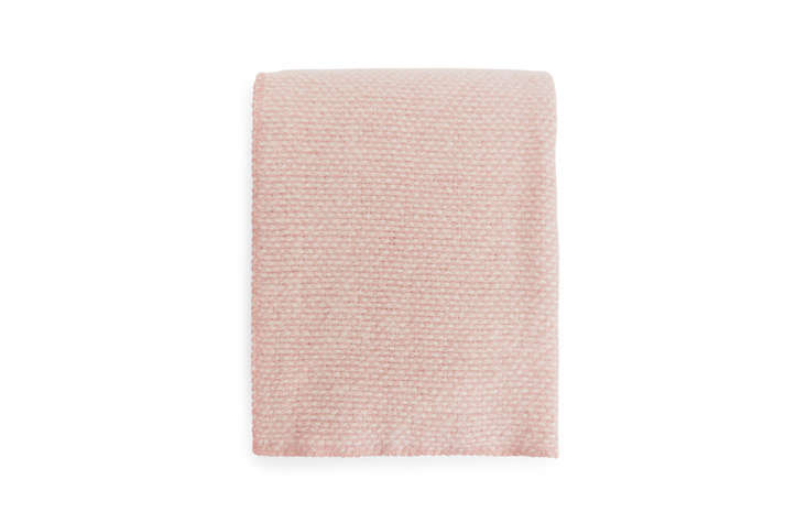 The Domino Blanket is by longstanding Swedish company Klippan, founded in 1879 by a master spinner at a prison, who then went on to found the mill in an abandoned town in the country’s south. The mill is now run by the fourth and fifth generations of the same family. The blanket is made of 100 percent lambswool; the green and grey colors are currently sold out, but the pink is 690 SEK.